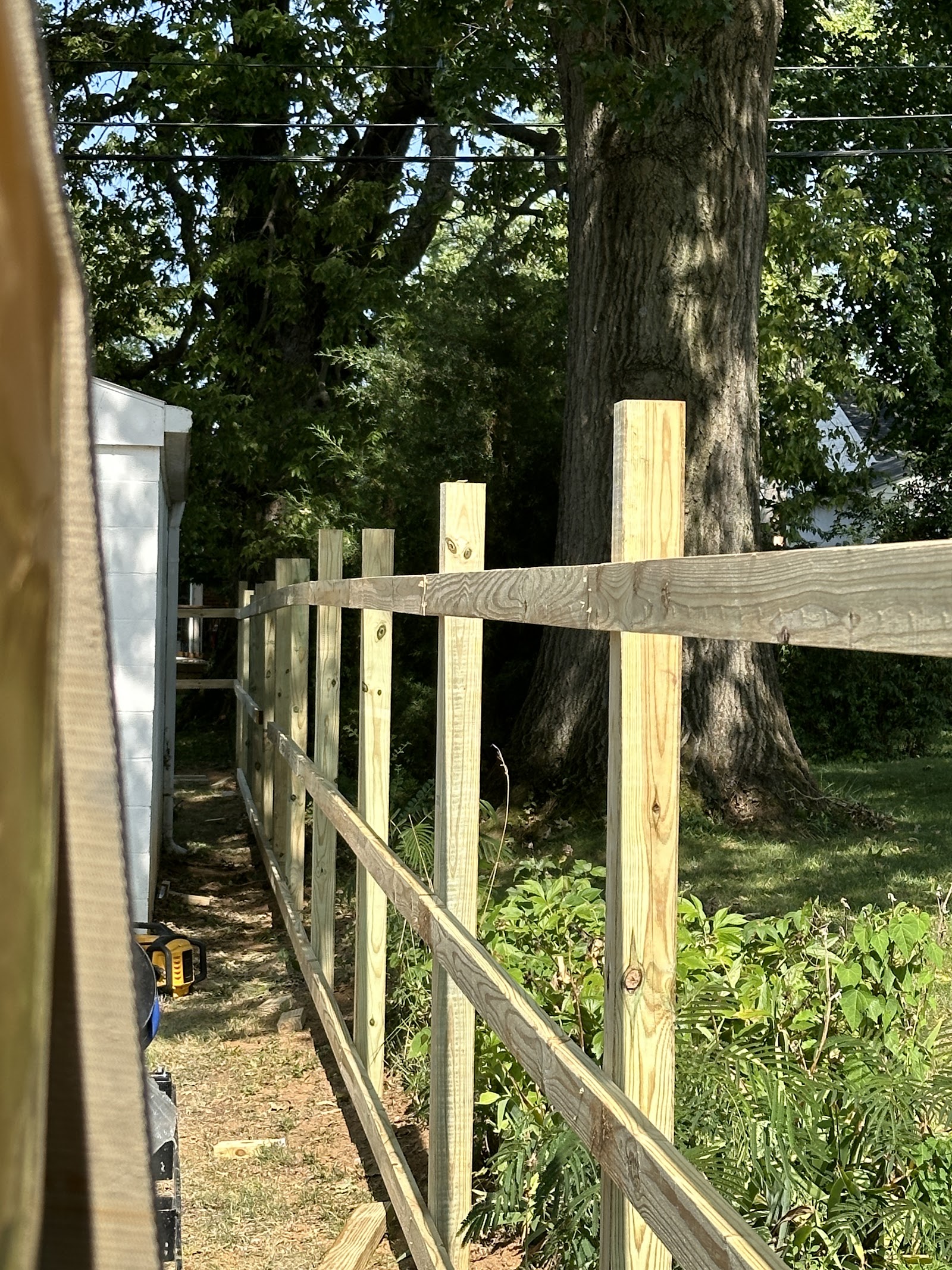 Wood fence frame during installation